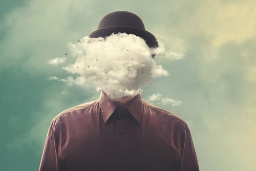 a guy's face is covered by cloud